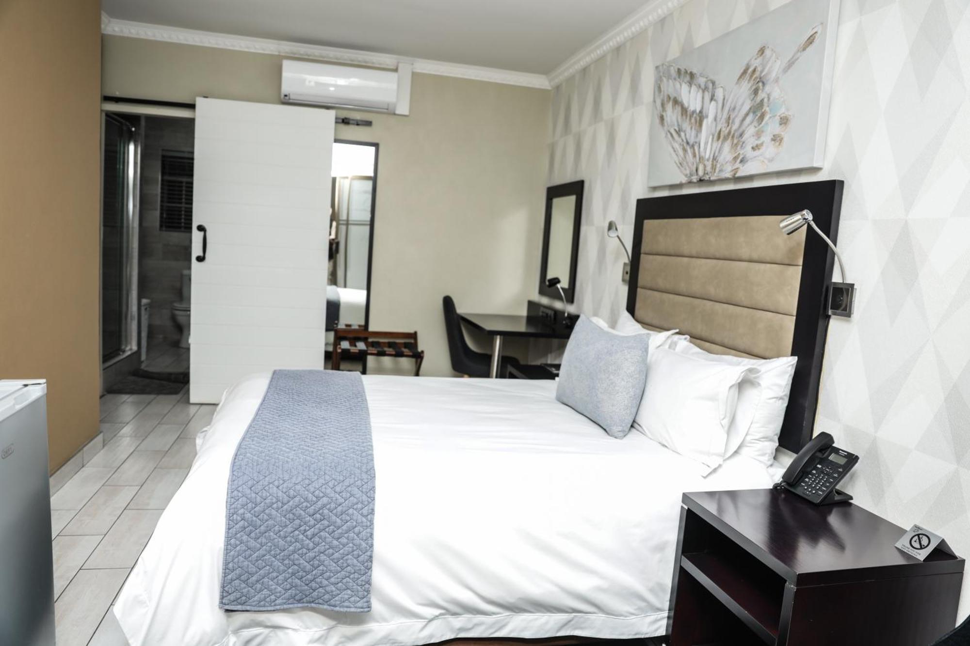 Q'S Boutique Stay Standerton Экстерьер фото